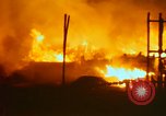 Image of Fires rage and aircraft are destroyed from rocket attack Vietnam, 1969, second 32 stock footage video 65675024997