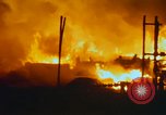 Image of Fires rage and aircraft are destroyed from rocket attack Vietnam, 1969, second 33 stock footage video 65675024997