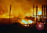 Image of Fires rage and aircraft are destroyed from rocket attack Vietnam, 1969, second 34 stock footage video 65675024997