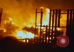 Image of Fires rage and aircraft are destroyed from rocket attack Vietnam, 1969, second 36 stock footage video 65675024997