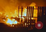 Image of Fires rage and aircraft are destroyed from rocket attack Vietnam, 1969, second 37 stock footage video 65675024997