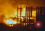 Image of Fires rage and aircraft are destroyed from rocket attack Vietnam, 1969, second 39 stock footage video 65675024997
