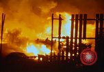Image of Fires rage and aircraft are destroyed from rocket attack Vietnam, 1969, second 41 stock footage video 65675024997