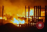 Image of Fires rage and aircraft are destroyed from rocket attack Vietnam, 1969, second 42 stock footage video 65675024997