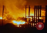 Image of Fires rage and aircraft are destroyed from rocket attack Vietnam, 1969, second 44 stock footage video 65675024997