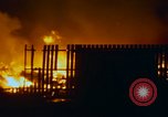 Image of Fires rage and aircraft are destroyed from rocket attack Vietnam, 1969, second 48 stock footage video 65675024997