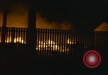Image of Fires rage and aircraft are destroyed from rocket attack Vietnam, 1969, second 52 stock footage video 65675024997