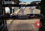Image of food service Vietnam, 1965, second 10 stock footage video 65675025016