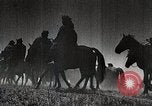 Image of Mongolian horsemen Japan, 1933, second 14 stock footage video 65675025030