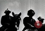 Image of Mongolian horsemen Japan, 1933, second 26 stock footage video 65675025030