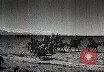 Image of Mongolian horsemen Japan, 1933, second 31 stock footage video 65675025030