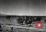 Image of Mongolian horsemen Japan, 1933, second 32 stock footage video 65675025030