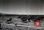 Image of Mongolian horsemen Japan, 1933, second 33 stock footage video 65675025030