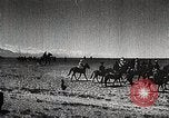 Image of Mongolian horsemen Japan, 1933, second 34 stock footage video 65675025030