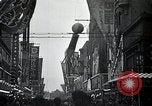 Image of Japanese in Western garb seen on city sidewalks Japan, 1931, second 31 stock footage video 65675025038