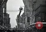 Image of Japanese in Western garb seen on city sidewalks Japan, 1931, second 33 stock footage video 65675025038