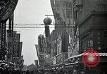 Image of Japanese in Western garb seen on city sidewalks Japan, 1931, second 34 stock footage video 65675025038