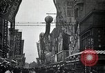 Image of Japanese in Western garb seen on city sidewalks Japan, 1931, second 36 stock footage video 65675025038