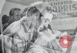 Image of Japanese in Western garb seen on city sidewalks Japan, 1931, second 41 stock footage video 65675025038