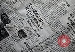 Image of Japanese in Western garb seen on city sidewalks Japan, 1931, second 58 stock footage video 65675025038