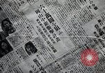 Image of Japanese in Western garb seen on city sidewalks Japan, 1931, second 59 stock footage video 65675025038
