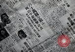 Image of Japanese in Western garb seen on city sidewalks Japan, 1931, second 60 stock footage video 65675025038