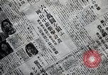 Image of Japanese in Western garb seen on city sidewalks Japan, 1931, second 61 stock footage video 65675025038