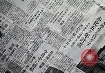 Image of Japanese in Western garb seen on city sidewalks Japan, 1931, second 62 stock footage video 65675025038