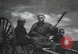 Standbild mongolischen Khuuchir string Instrument Mandschurei, 1932, aus Sekunde 15 historischem Filmmaterial Videoclip 65675025060