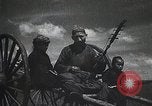 Standbild mongolischen Khuuchir string Instrument Mandschurei, 1932, aus Sekunde 20 historischem Filmmaterial Videoclip 65675025060