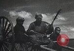 Standbild mongolischen Khuuchir string Instrument Mandschurei, 1932, aus Sekunde 21 historischem Filmmaterial Videoclip 65675025060
