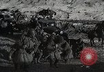 Standbild japanische Truppen zUSAmmengekauert im Lkw Mandschurei, 1932, aus Sekunde 5 historischem Filmmaterial Videoclip 65675025064