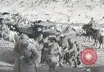 Standbild japanische Truppen zUSAmmengekauert im Lkw Mandschurei, 1932, aus Sekunde 8 historischem Filmmaterial Videoclip 65675025064
