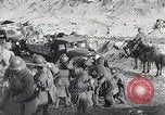 Standbild japanische Truppen zUSAmmengekauert im Lkw Mandschurei, 1932, aus Sekunde 9 historischem Filmmaterial Videoclip 65675025064