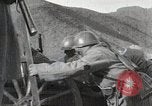 Standbild japanische Truppen zUSAmmengekauert im Lkw Mandschurei, 1932, aus Sekunde 16 historischem Filmmaterial Videoclip 65675025064