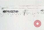 Standbild japanische Truppen zUSAmmengekauert im Lkw Mandschurei, 1932, aus Sekunde 50 historischem Filmmaterial Videoclip 65675025064