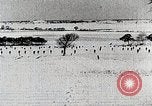 Standbild japanische Truppen zUSAmmengekauert im Lkw Mandschurei, 1932, aus Sekunde 51 historischem Filmmaterial Videoclip 65675025064