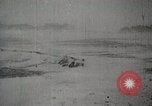 Standbild japanische Truppen zUSAmmengekauert im Lkw Mandschurei, 1932, aus Sekunde 61 historischem Filmmaterial Videoclip 65675025064