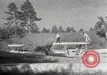 Image of sheep shearing Mongolia, 1932, second 30 stock footage video 65675025067