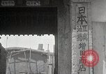 Image of Woman with sanxian Harbin China, 1932, second 14 stock footage video 65675025071