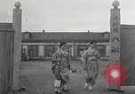 Image of Woman with sanxian Harbin China, 1932, second 19 stock footage video 65675025071