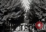 Image of Woman with sanxian Harbin China, 1932, second 27 stock footage video 65675025071