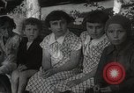 Image of Woman with sanxian Harbin China, 1932, second 47 stock footage video 65675025071