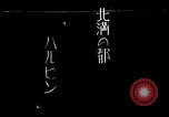 Standbild chinesischen Eastern Railway Fahne über dem Bahnhof Harbin Manchukuo, 1932, aus Sekunde 1 historischem Filmmaterial Videoclip 65675025073