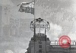 Standbild chinesischen Eastern Railway Fahne über dem Bahnhof Harbin Manchukuo, 1932, aus Sekunde 8 historischem Filmmaterial Videoclip 65675025073