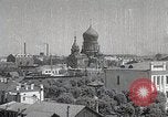Standbild chinesischen Eastern Railway Fahne über dem Bahnhof Harbin Manchukuo, 1932, aus Sekunde 20 historischem Filmmaterial Videoclip 65675025073