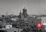 Standbild chinesischen Eastern Railway Fahne über dem Bahnhof Harbin Manchukuo, 1932, aus Sekunde 21 historischem Filmmaterial Videoclip 65675025073