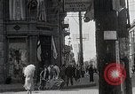 Standbild chinesischen Eastern Railway Fahne über dem Bahnhof Harbin Manchukuo, 1932, aus Sekunde 23 historischem Filmmaterial Videoclip 65675025073