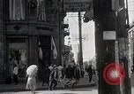 Standbild chinesischen Eastern Railway Fahne über dem Bahnhof Harbin Manchukuo, 1932, aus Sekunde 24 historischem Filmmaterial Videoclip 65675025073