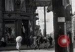 Standbild chinesischen Eastern Railway Fahne über dem Bahnhof Harbin Manchukuo, 1932, aus Sekunde 25 historischem Filmmaterial Videoclip 65675025073